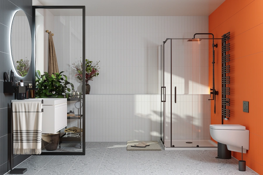 Modern bathroom with orange accent wall.