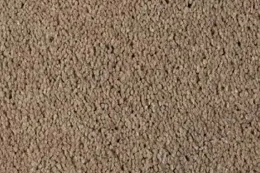 Beige textured carpet close-up.