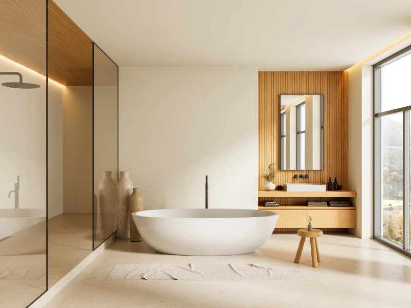 Modern bathroom with freestanding tub and shower.